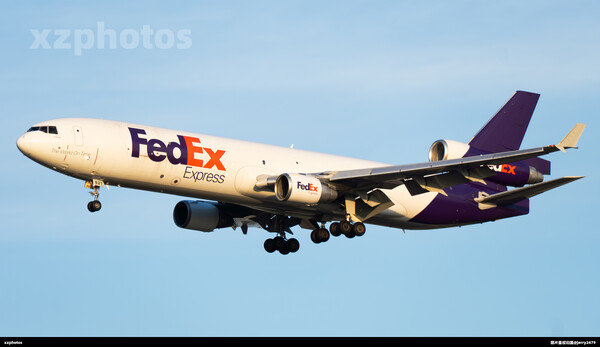 联邦快递MD11F黄金光降落上海浦东国际机场